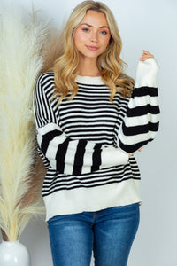 Long sleeved striped knit sweater