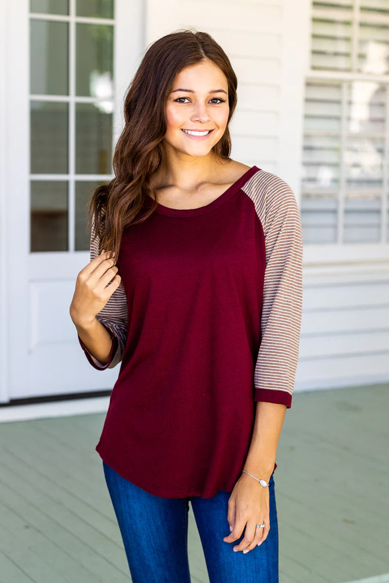 Maroon body with taupe striped raglan t