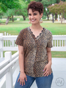 V neck leopard top with faux buttons